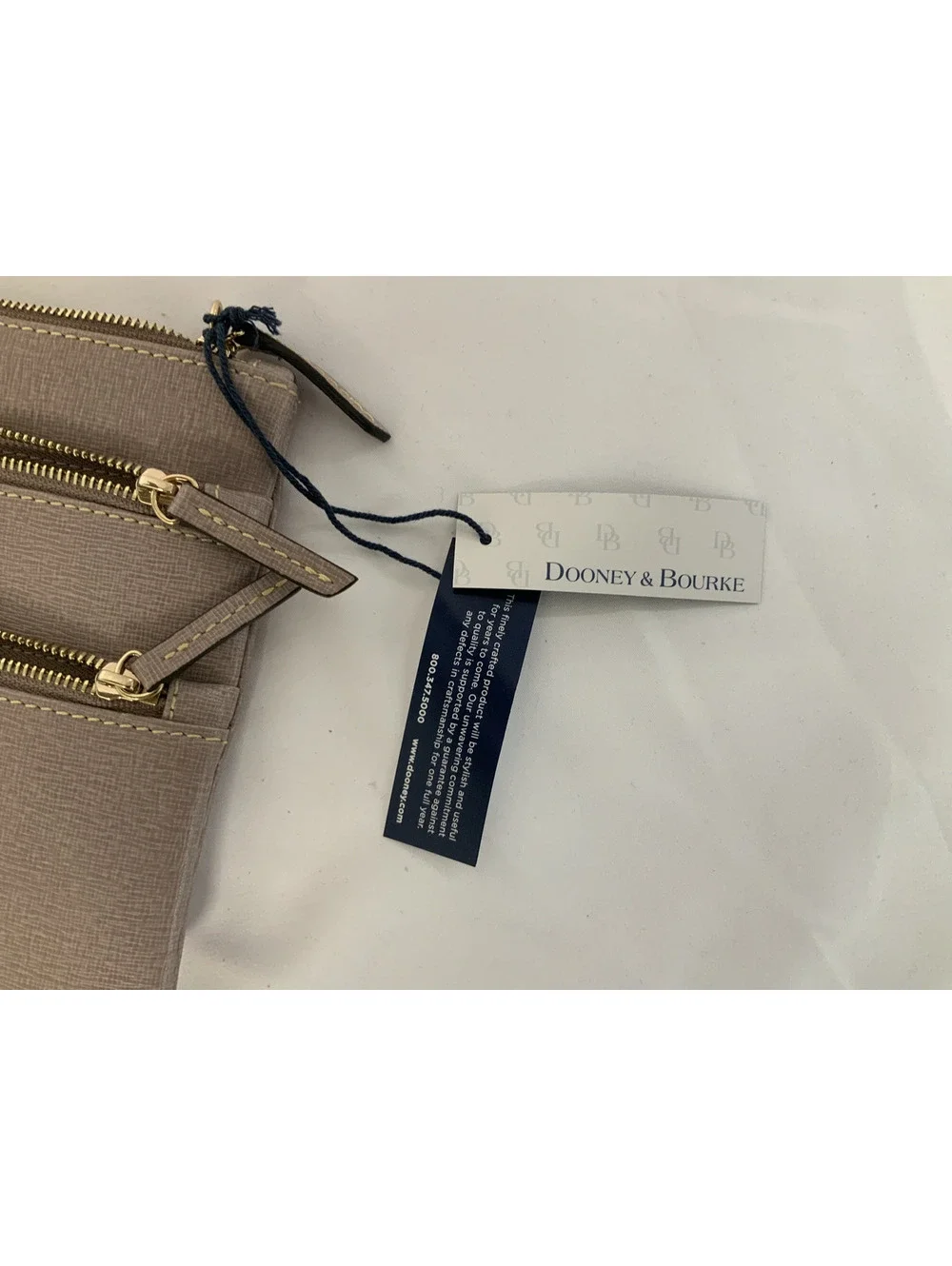 Dooney and bourke large triple zip wristelt-MISSING THE WRISTLET